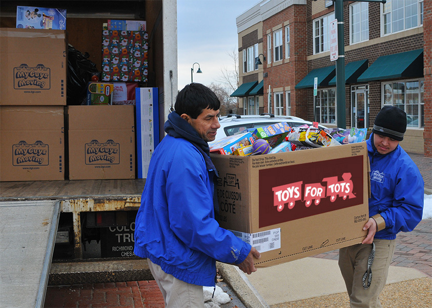 Ricardo & Jose loading toys 